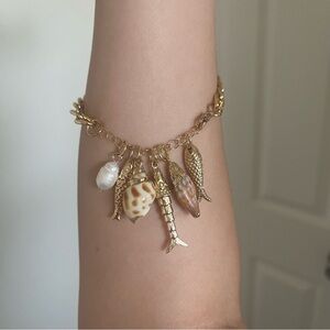 Gold Tone Coastal Seashell & Fish Accent Charm Bracelets